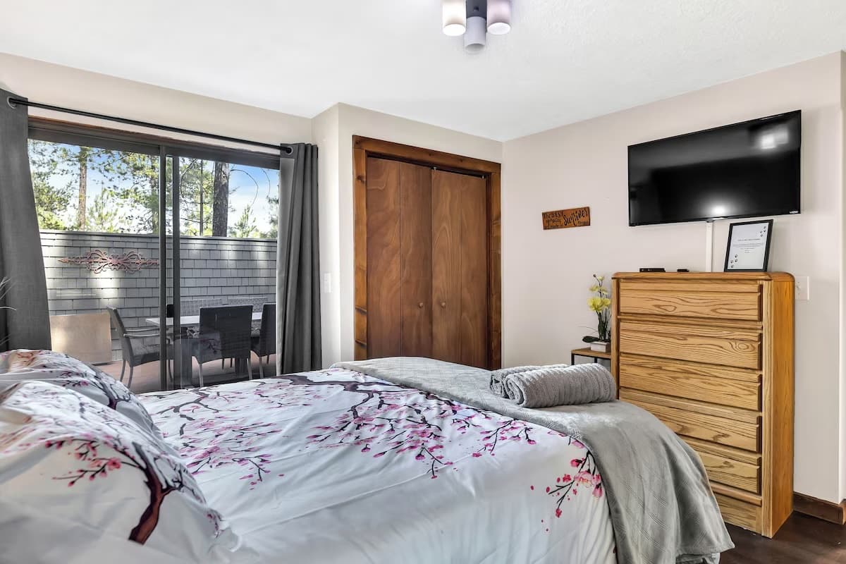 Bedroom with sliding door to deck